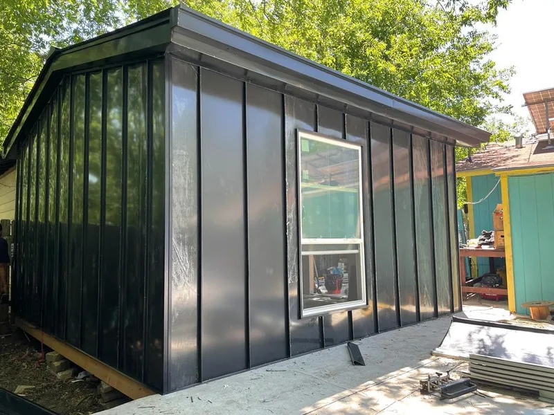 Black standing seam metal wall panels for Roof Inspection in Shafter